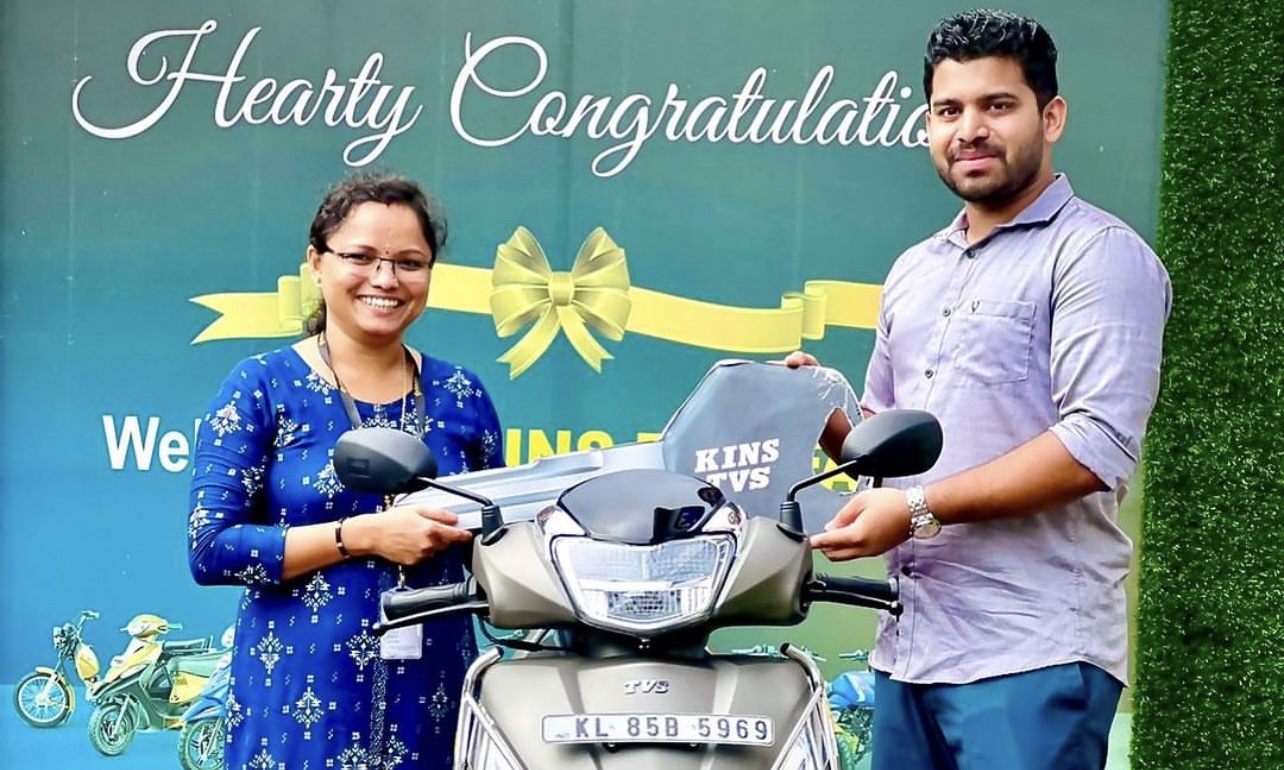 Recognition of Excellence: KC Musthafa Presents TVS Jupiter Scooter to Employee Gopika